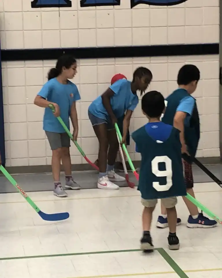 Kids playing various team sports and outdoor games at Boswin’s Multi Sports Camp in Mississauga, in partnership with Mississauga United FC.