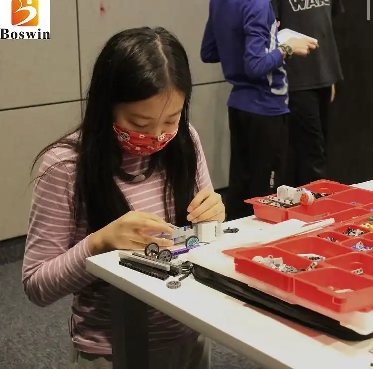 Kids aged 6 to 9 building and coding robots during Boswin’s Primary Robotics March Break Camp in Mississauga.