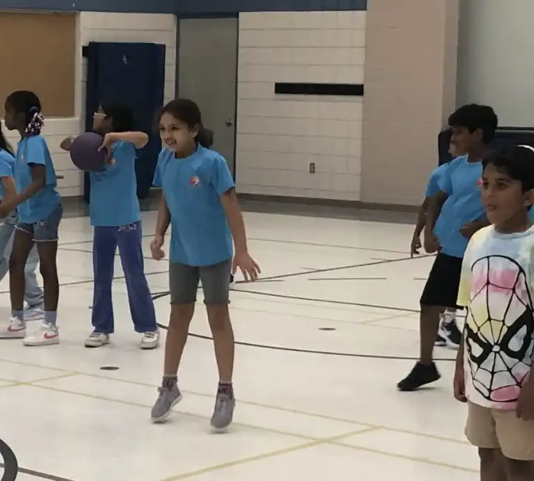Children playing sports and outdoor games at Boswin’s Minecraft & Sports Summer Camp in Mississauga.
