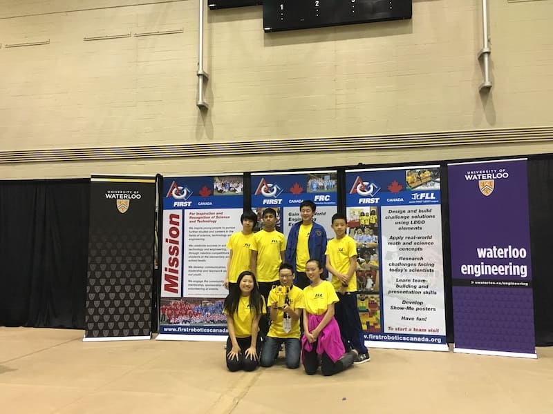 Boswin Robotics students concentrating on their LEGO robot during the 2017 First Lego League Robotics Competition